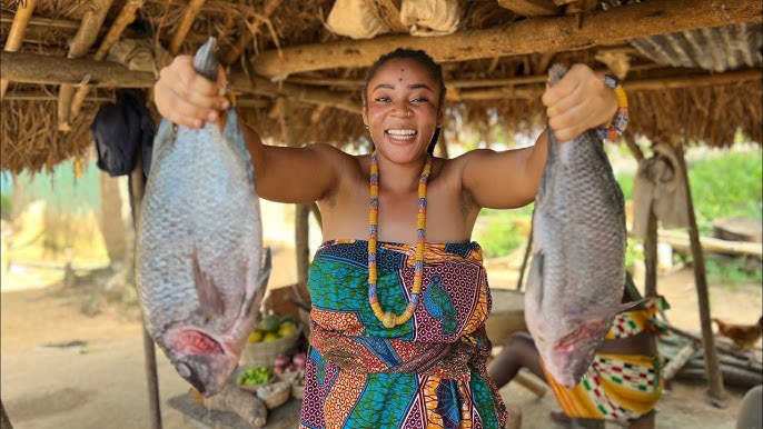 Smiling woman with large fish